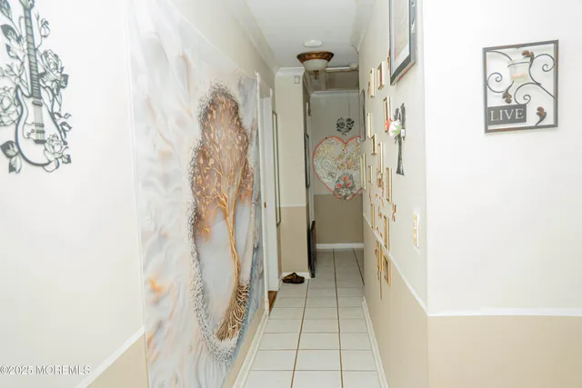 a bathroom with a toilet and a shower curtain