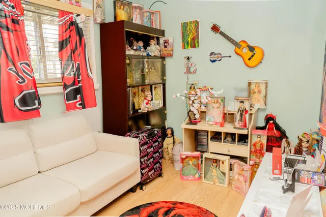 a room with toys and flat screen tv