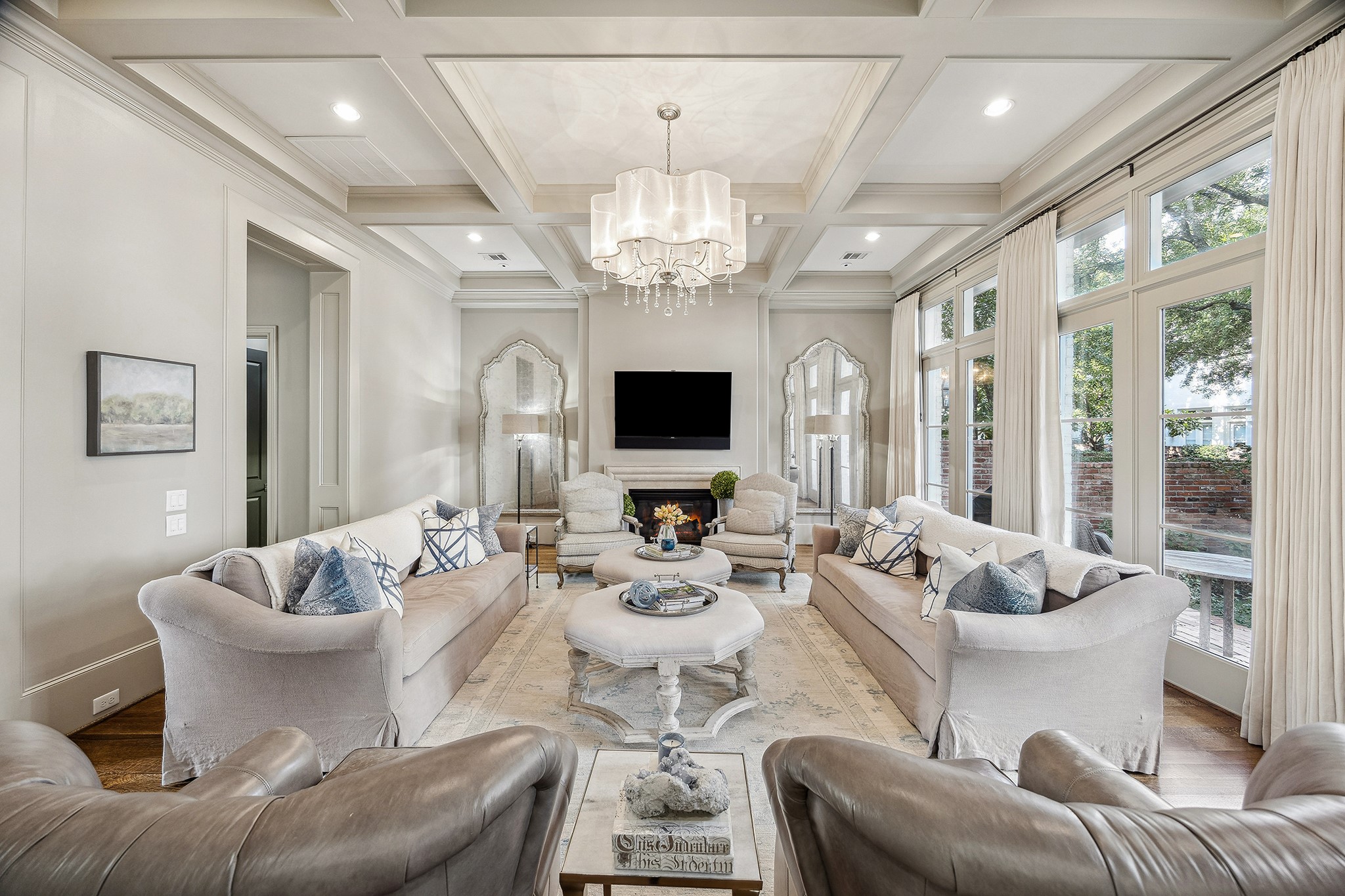 3240 Bammel Lane Houston, TX 77098 - Photo 13 of 34 a living room with furniture chandelier and a large window
