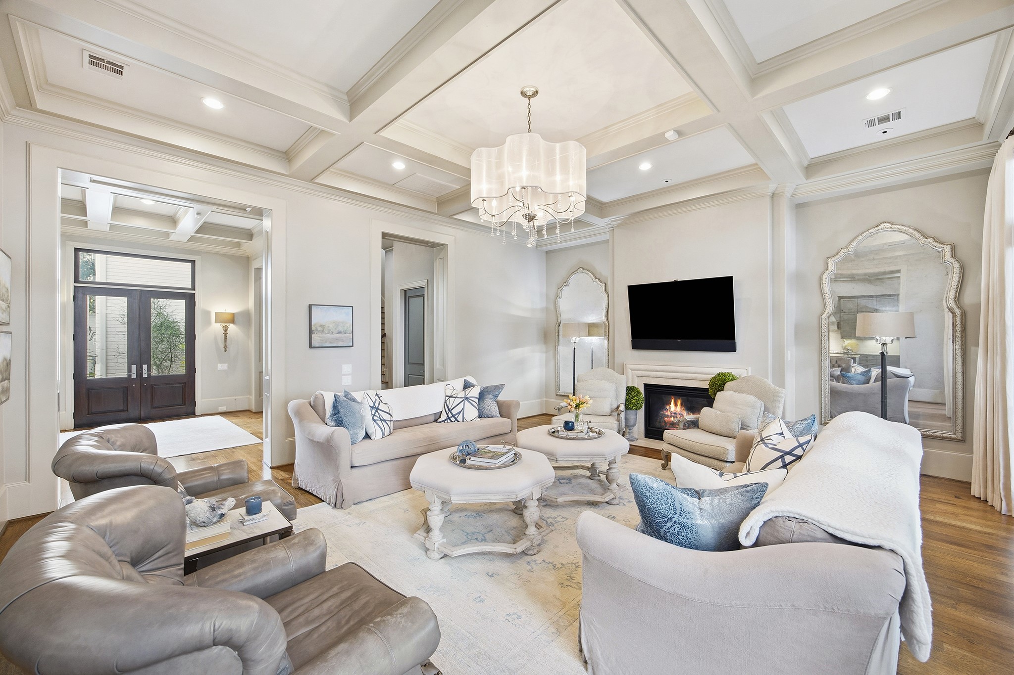 3240 Bammel Lane Houston, TX 77098 - Photo 14 of 34 a living room with furniture or chandelier and a flat screen tv