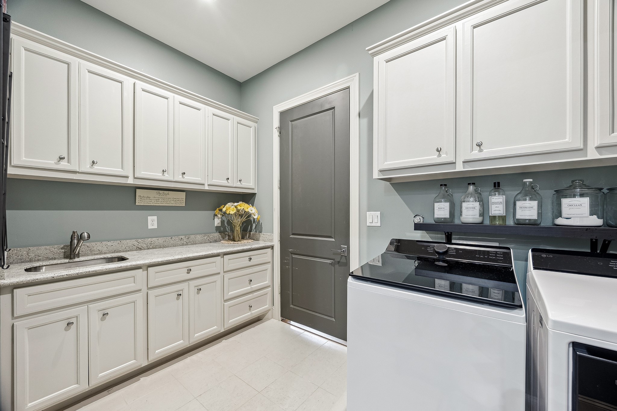 3240 Bammel Lane Houston, TX 77098 - Photo 24 of 34 a kitchen with stainless steel appliances granite countertop a refrigerator and a stove