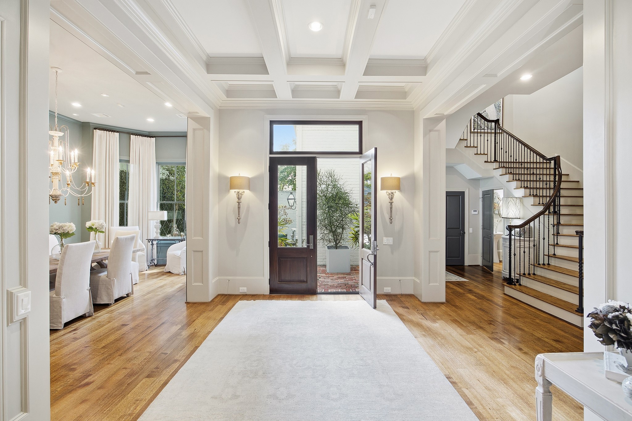 3240 Bammel Lane Houston, TX 77098 - Photo 5 of 34 a view of a hallway with wooden floor and windows