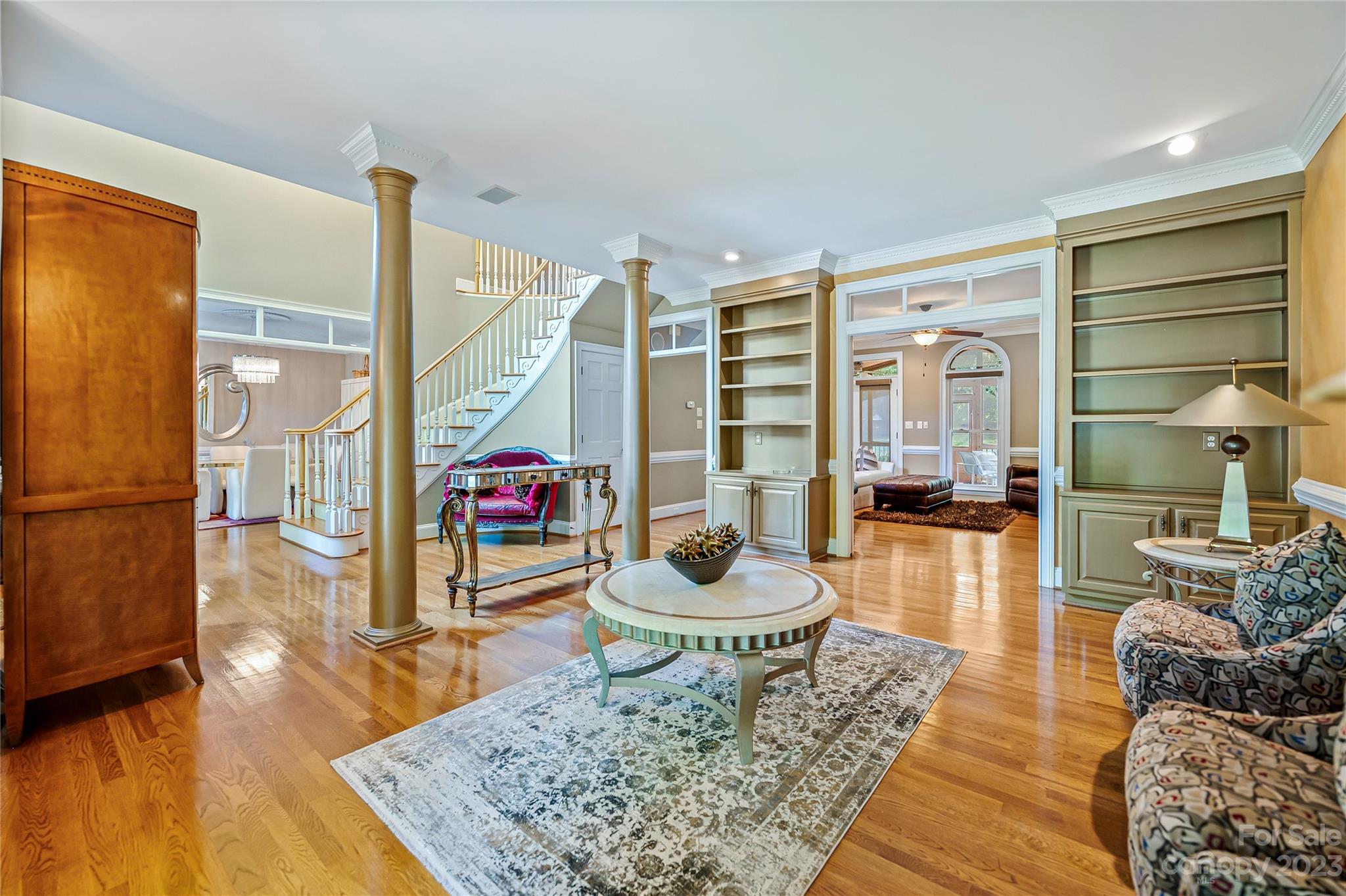 4517 Binfords Ridge Road Charlotte, NC 28226 - Photo 12 of 47 a living room with furniture and a wooden floor