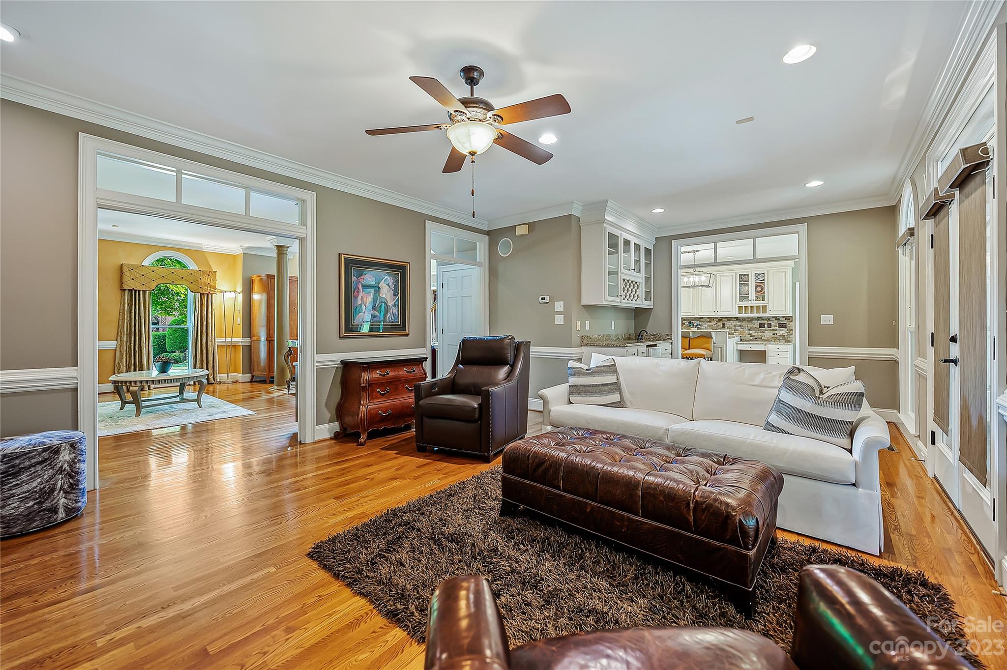 4517 Binfords Ridge Road Charlotte, NC 28226 - Photo 14 of 47 a living room with furniture kitchen view and a large window