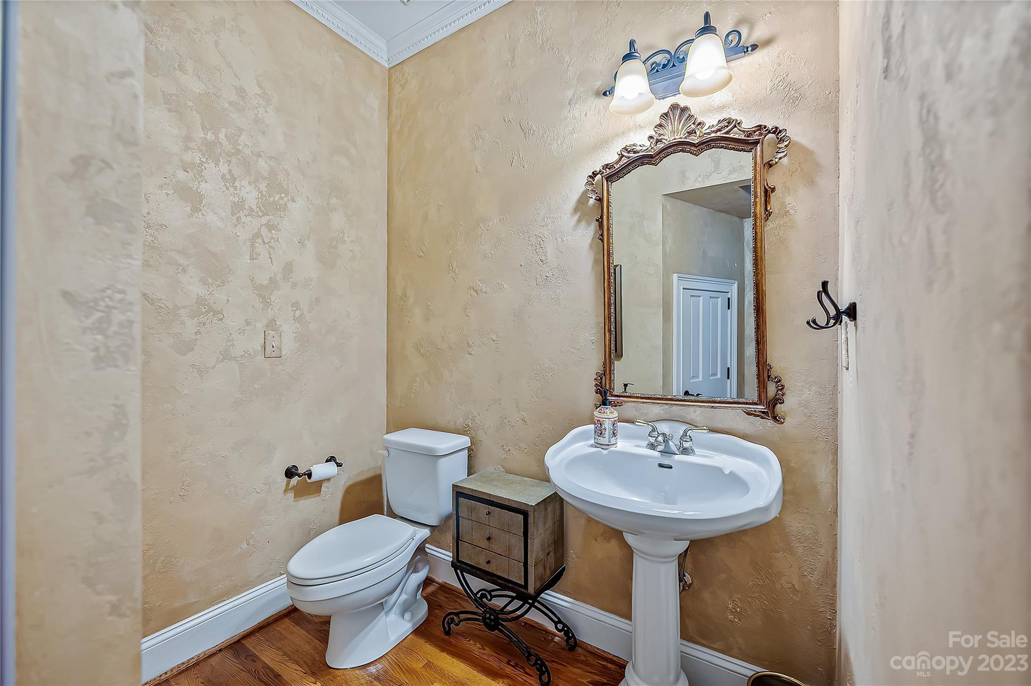 4517 Binfords Ridge Road Charlotte, NC 28226 - Photo 24 of 47 a bathroom with a sink toilet and a mirror