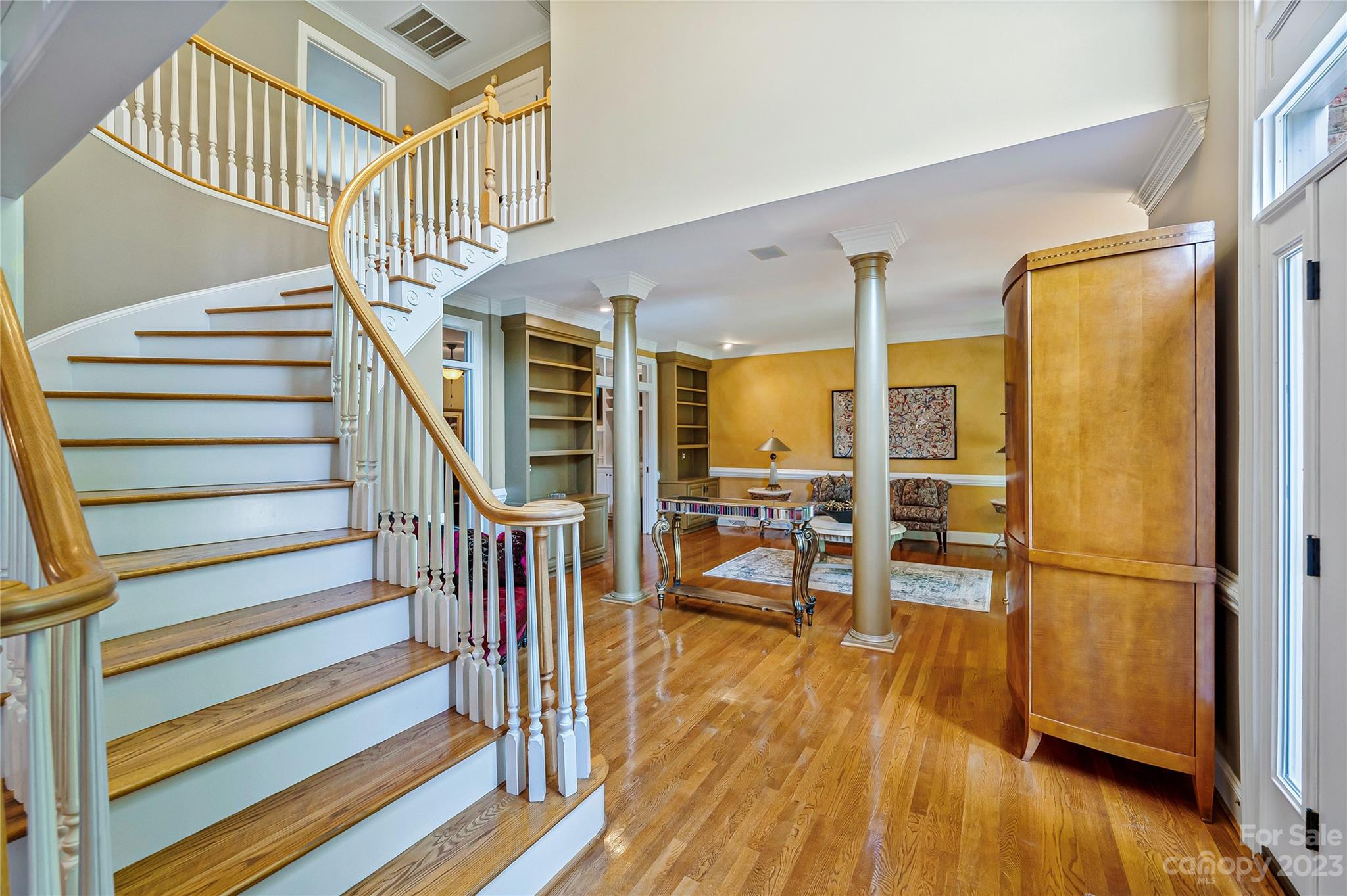 4517 Binfords Ridge Road Charlotte, NC 28226 - Photo 10 of 47 a view of a hallway with wooden floor and staircase