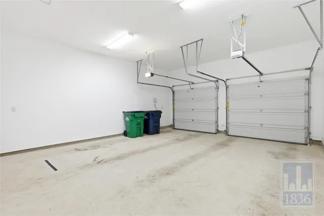 a view of a storage & utility room with cabinets