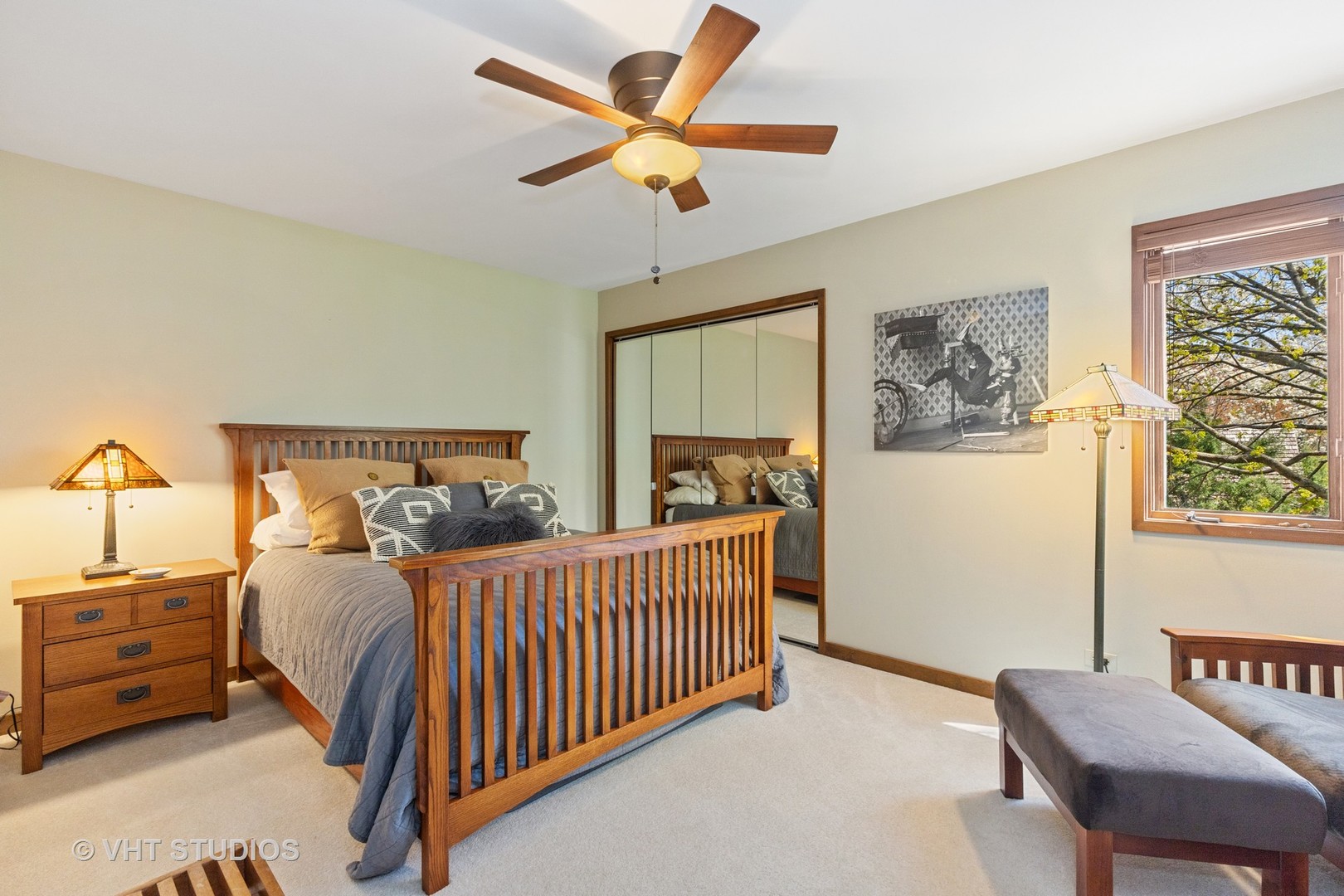 770 Valley Road Lake Forest, IL 60045 - Photo 19 of 29 a bedroom with a bed and a chandelier