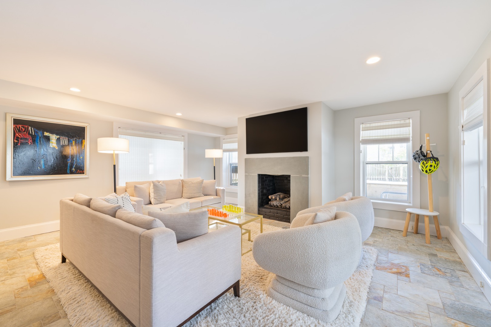2 Silver Street Nantucket, MA 02554 - Photo 24 of 30 a living room with furniture a fireplace and a flat screen tv