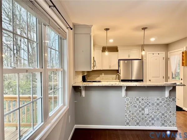 a view of storage and utility room with racks on the wall