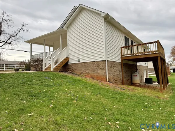 a kitchen with stainless steel appliances a refrigerator sink and microwave