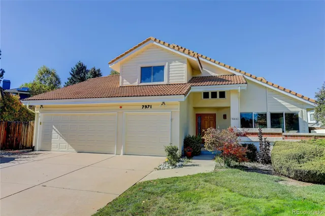 a front view of house with yard