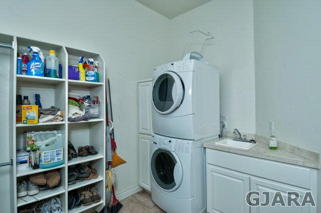 887 25 Road Grand Junction, CO 81505 - Photo 21 of 42 a storage room with washer and dryer