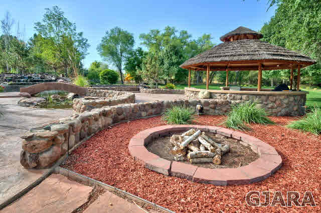 887 25 Road Grand Junction, CO 81505 - Photo 32 of 42 a view of a backyard with potted plants