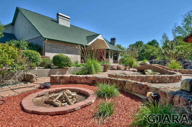 887 25 Road Grand Junction, CO 81505 - Photo 33 of 42 a view of a swimming pool with a patio