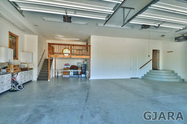 887 25 Road Grand Junction, CO 81505 - Photo 41 of 42 a view of a livingroom with furniture and a garage