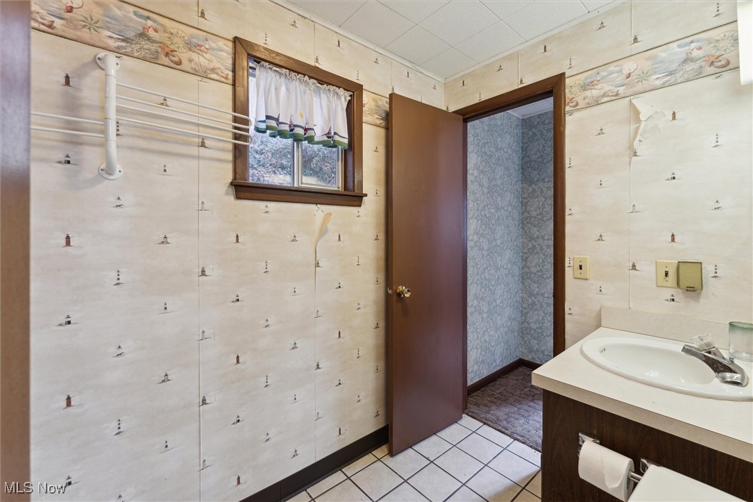86413 North Bay Road Scio, OH 43988 - Photo 36 of 45 Bathroom featuring tile patterned flooring and vanity