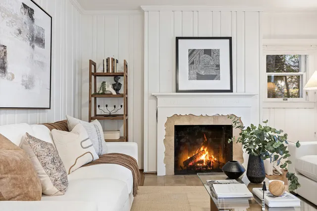 a spacious bedroom with a large bed and a window