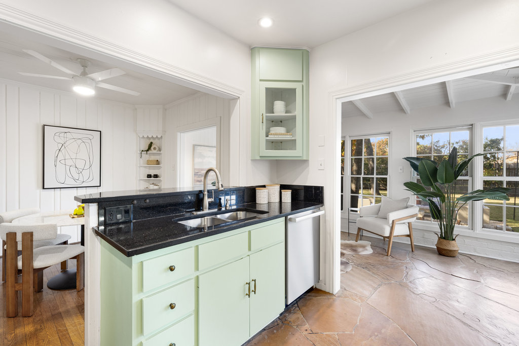 3808 Avenue F Austin, TX 78751 - Photo 9 of 22 Kitchen flows into sunroom with beamed ceiling