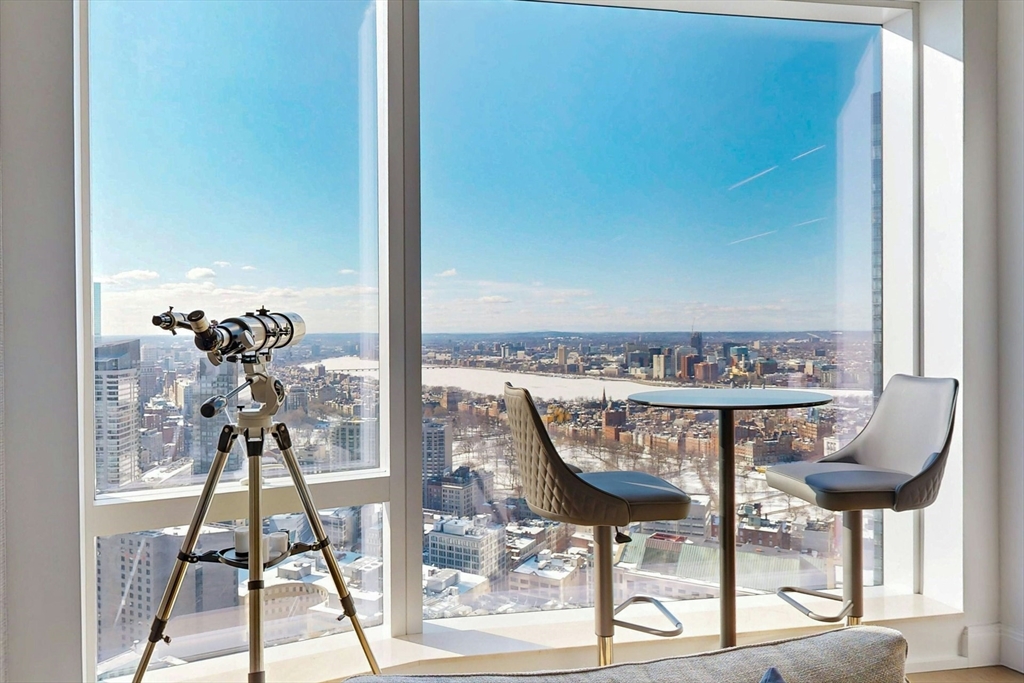 240 Devonshire Street, Unit 4505 Boston, MA 02110 - Photo 2 of 42 a view of a room with furniture and wooden floor