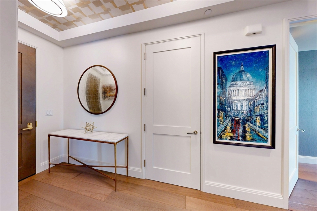 240 Devonshire Street, Unit 4505 Boston, MA 02110 - Photo 23 of 42 a view of a hallway with workspace