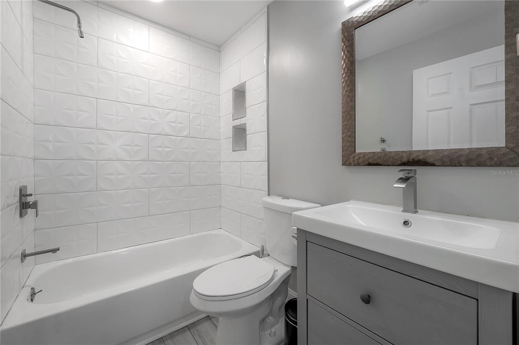 2341 West Chestnut Street Tampa, FL 33607 - Photo 26 of 42 a bathroom with a sink toilet and bathtub