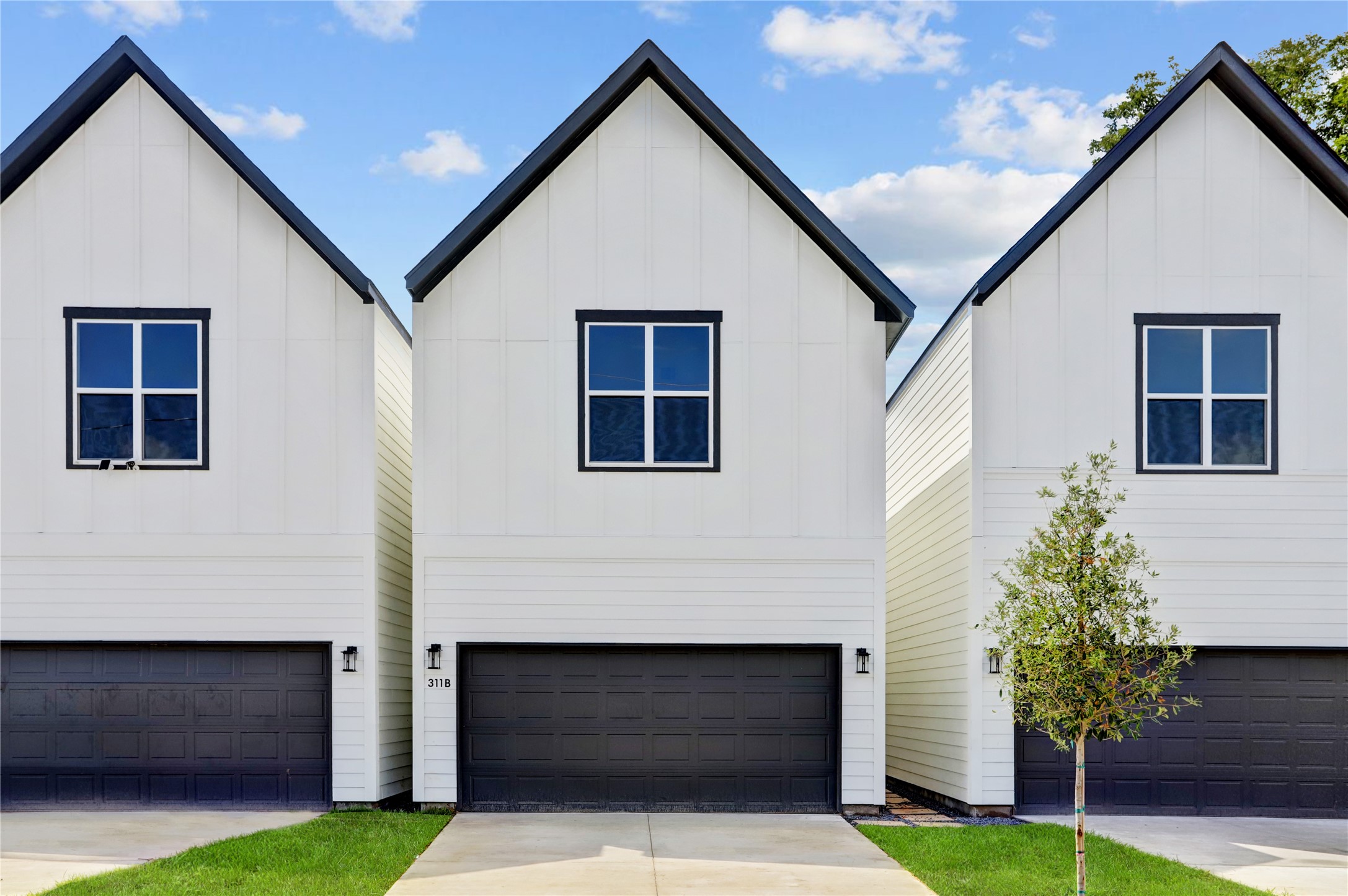 311 Marcella Street, Unit A Houston, TX 77091 - Photo 1 of 34 Each home has 2 car garage, long double wide driveway and sprinklers front and back. Oversized 21' X 18.5' garage fits 2 F-150s!