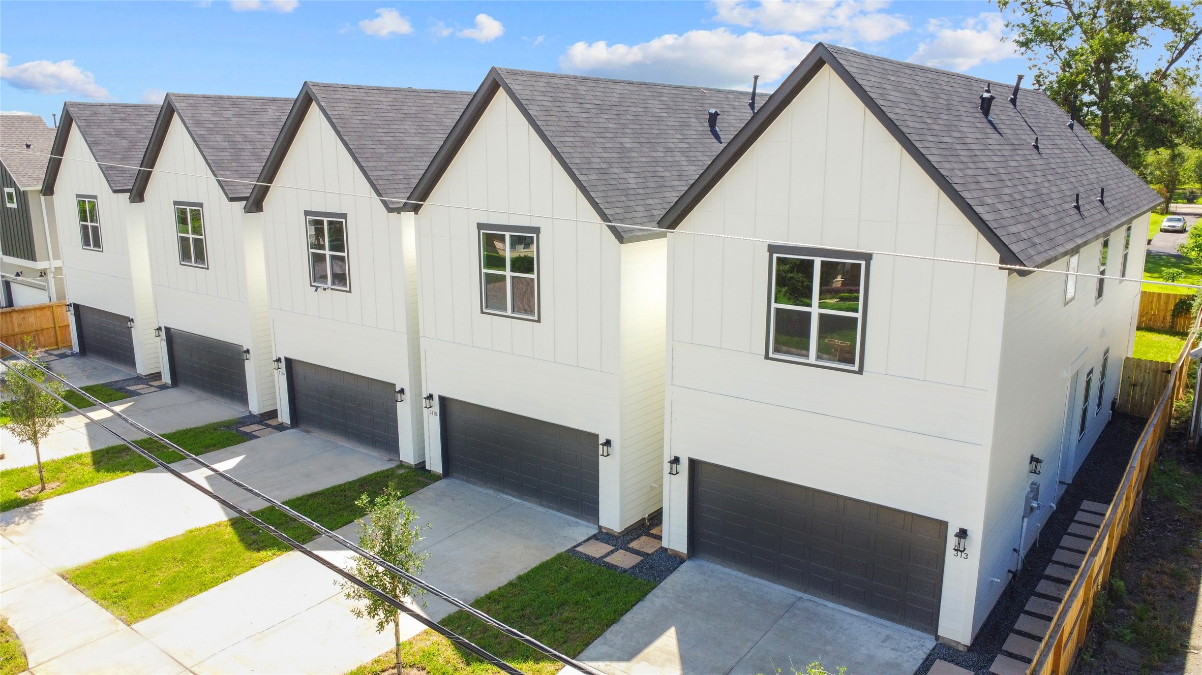 311 Marcella Street, Unit A Houston, TX 77091 - Photo 2 of 34 Welcome to Marcella Estates! 5 stunning new 2-story contemporary residences by Setting Stone Builders. Gutters added after these photos.