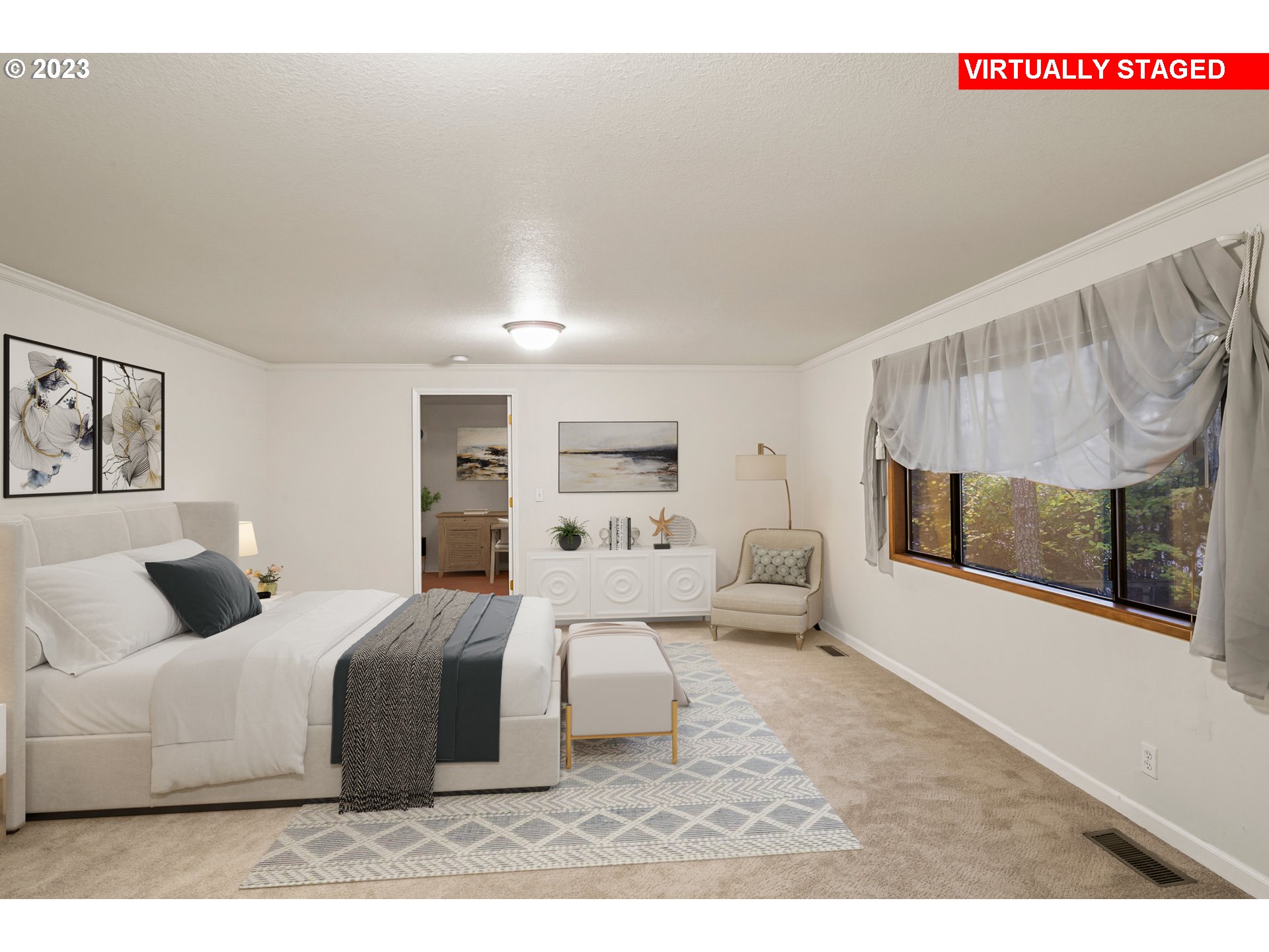 3431 Timberline Drive Eugene, OR 97405 - Photo 25 of 39 a bedroom with a large bed and a couch