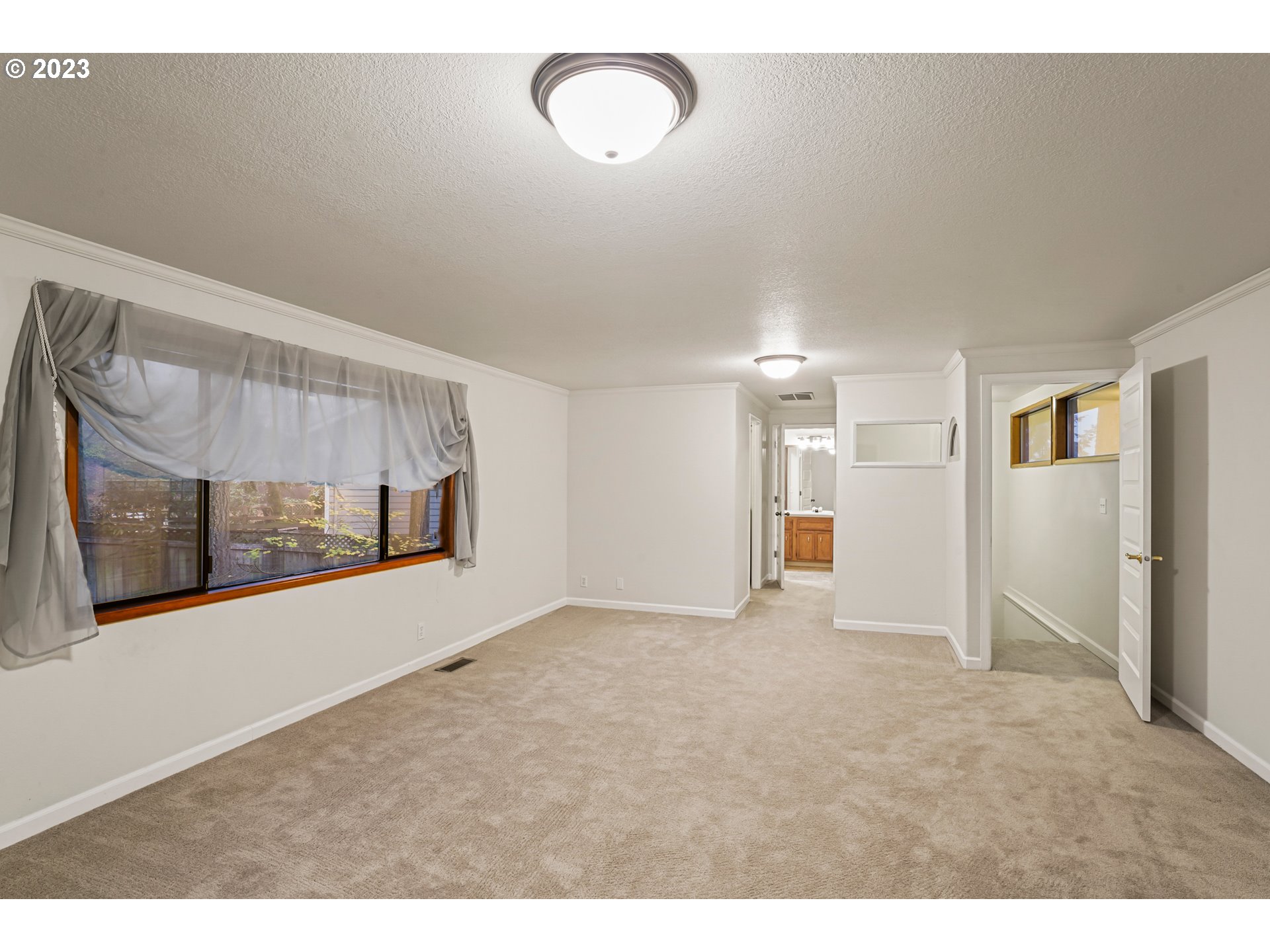 3431 Timberline Drive Eugene, OR 97405 - Photo 27 of 39 a view of empty room with wooden floor