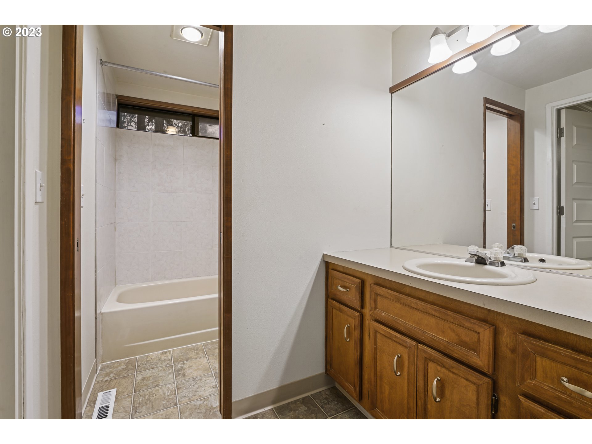 3431 Timberline Drive Eugene, OR 97405 - Photo 33 of 39 a bathroom with a sink and a mirror