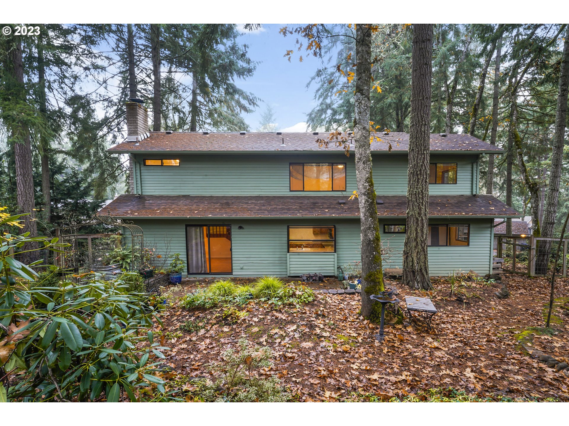 3431 Timberline Drive Eugene, OR 97405 - Photo 37 of 39 a view of a house with a garden