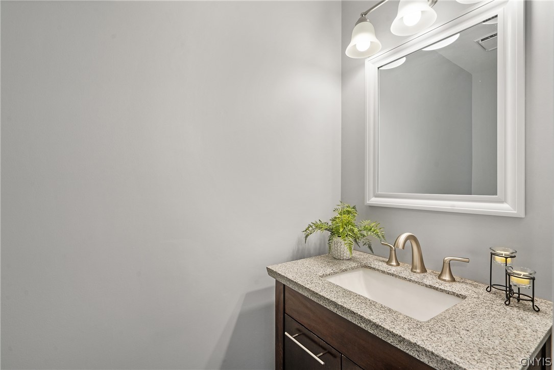 8841 Wandering Way Lysander, NY 13027 - Photo 22 of 42 1st level half bathroom