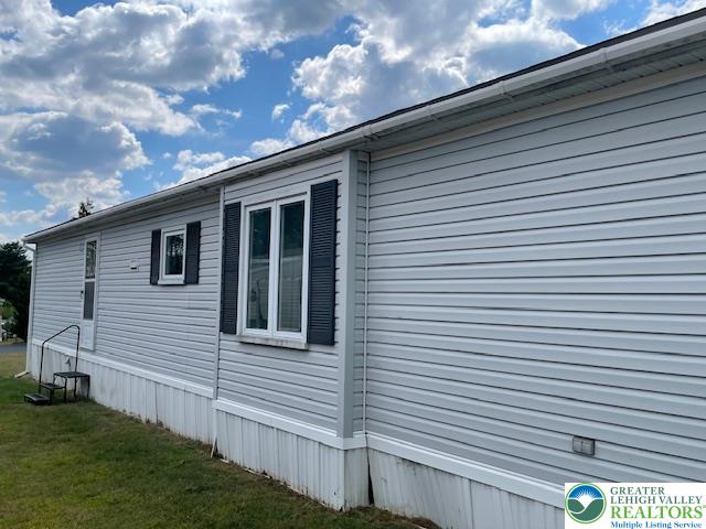 38 De Rose Street Walnutport, PA 18088 - Photo 21 of 27 a view of a back yard of the house