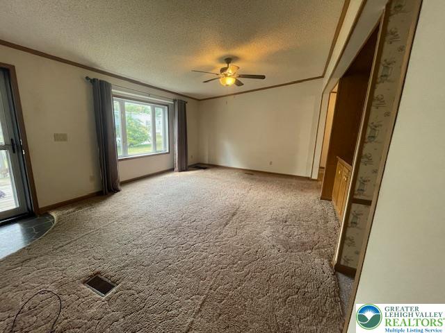 38 De Rose Street Walnutport, PA 18088 - Photo 3 of 27 a view of a livingroom with a ceiling fan and window