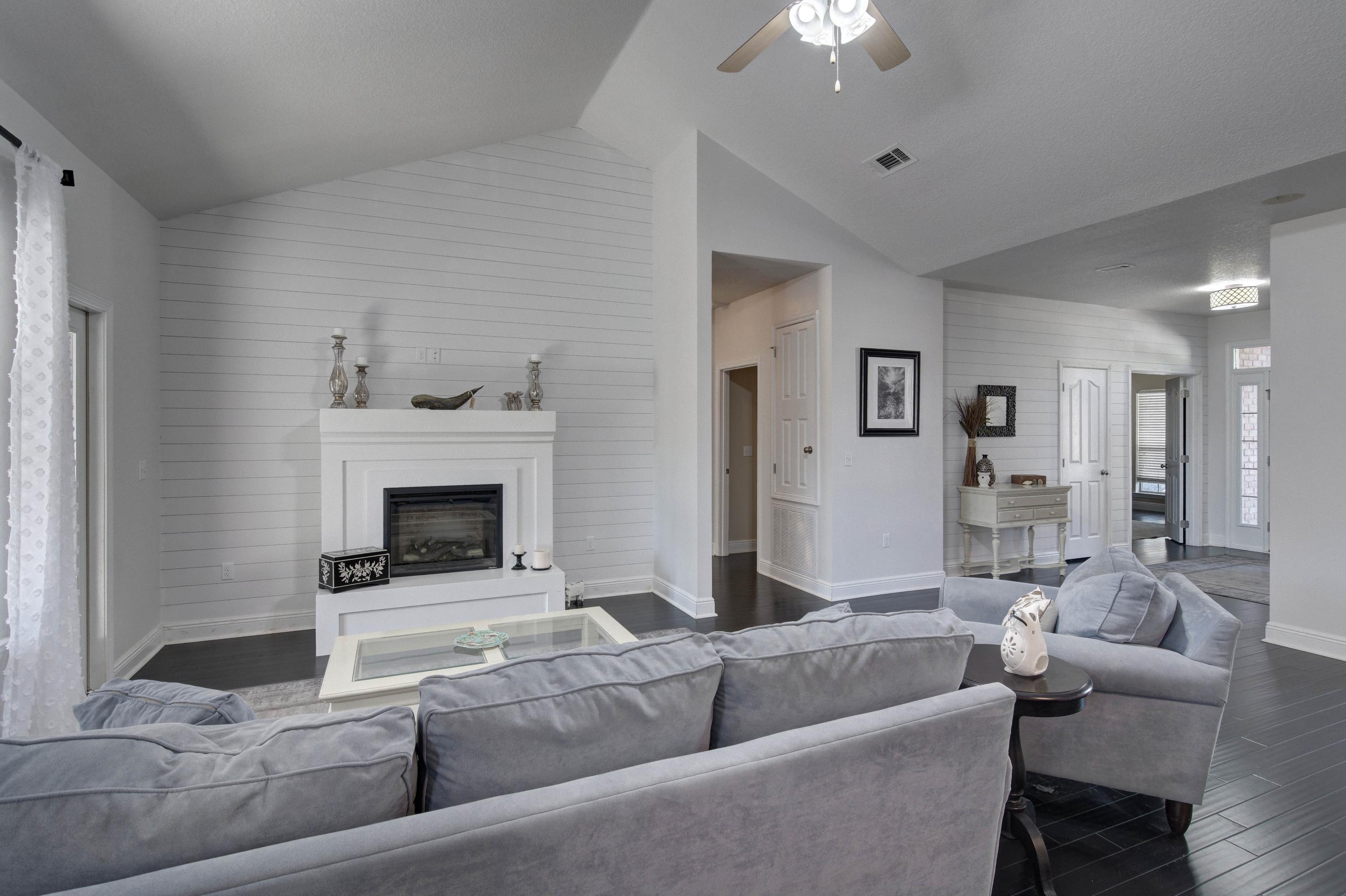 52 Mango Lane Freeport, FL 32439 - Photo 12 of 69 a living room with furniture and a fireplace