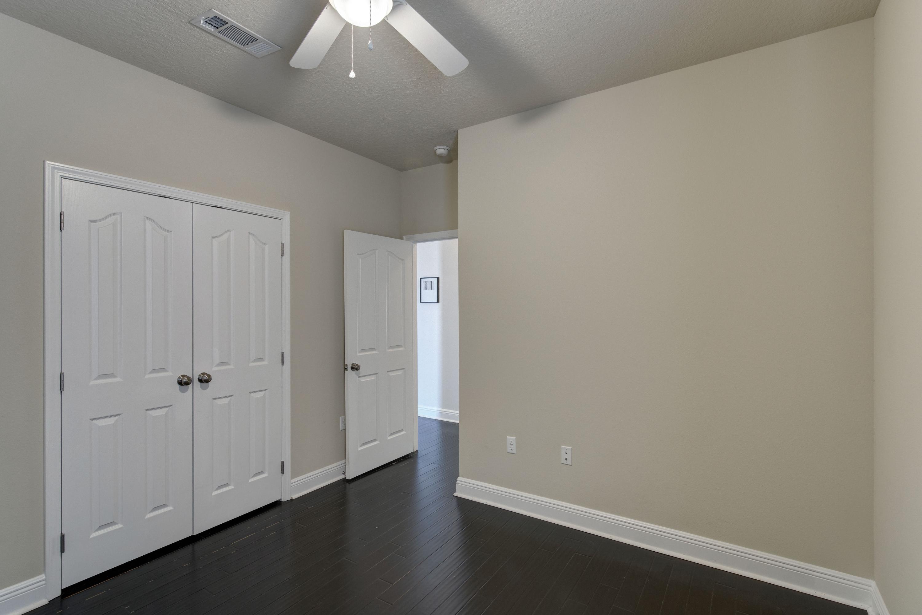 52 Mango Lane Freeport, FL 32439 - Photo 35 of 69 wooden floor in an empty room