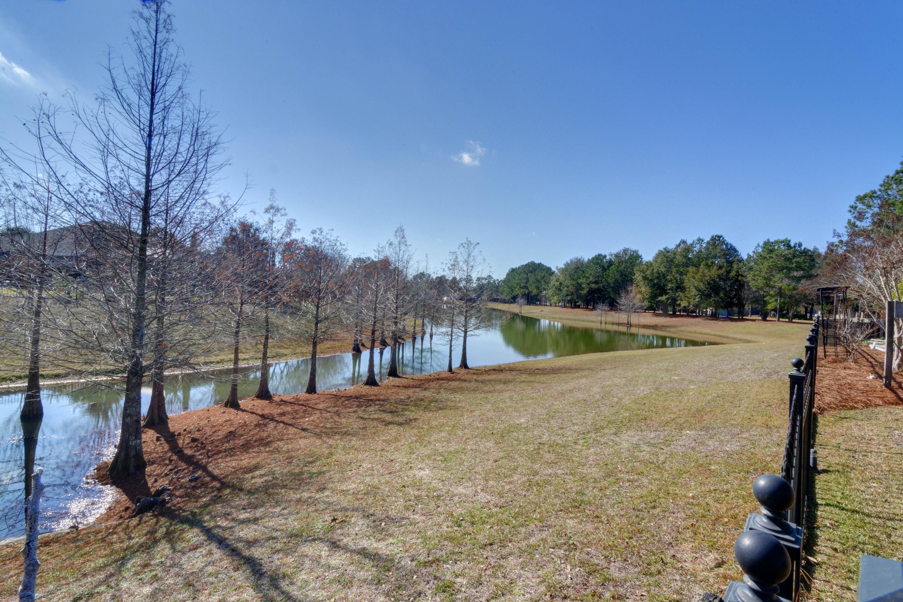 52 Mango Lane Freeport, FL 32439 - Photo 53 of 69 a view of outdoor space with deck and yard