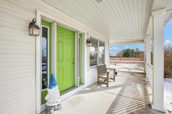 a porch with seating space