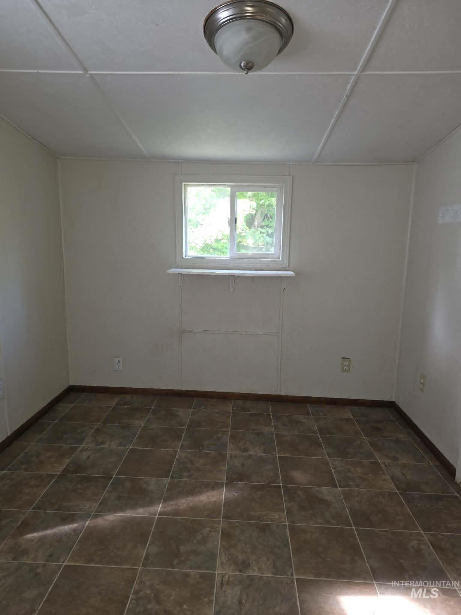 3871 Lakeview Road Orofino, ID 83544 - Photo 15 of 49 Room featuring neutral wall finishes and a window offering exterior light