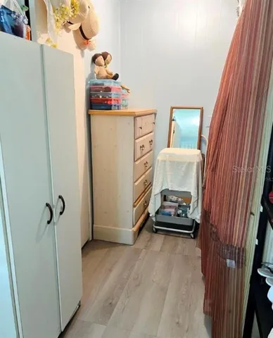 a bathroom with a sink a vanity and a mirror