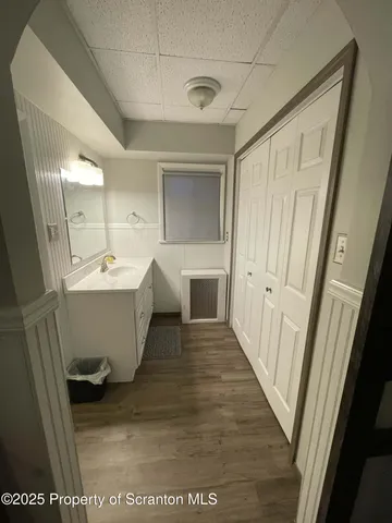 a view of a bathroom with a sink and a bathtub