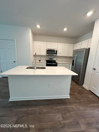 a bathroom with a sink a toilet
