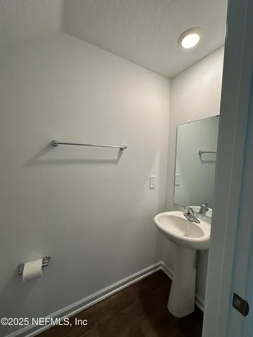 a bathroom with a sink a toilet