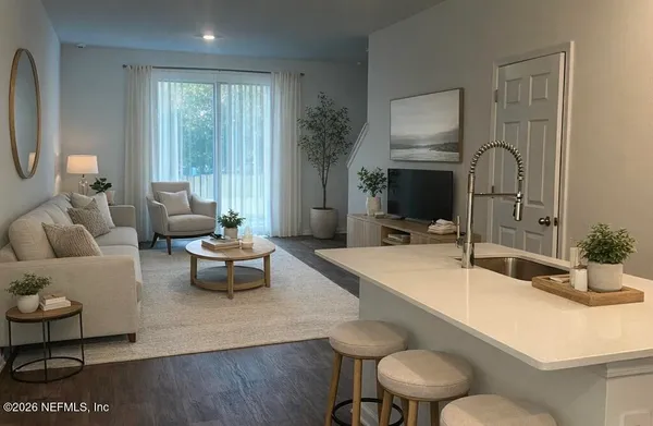 a bedroom with a bed and flat screen tv