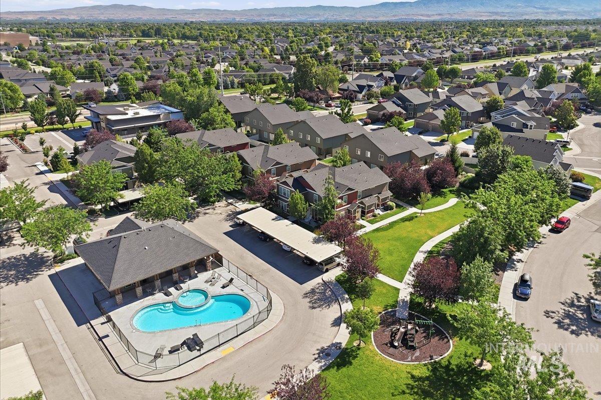 1303 West Brando Street Meridian, ID 83646 - Photo 48 of 49 Community pool and spa with an adjacent covered patio area