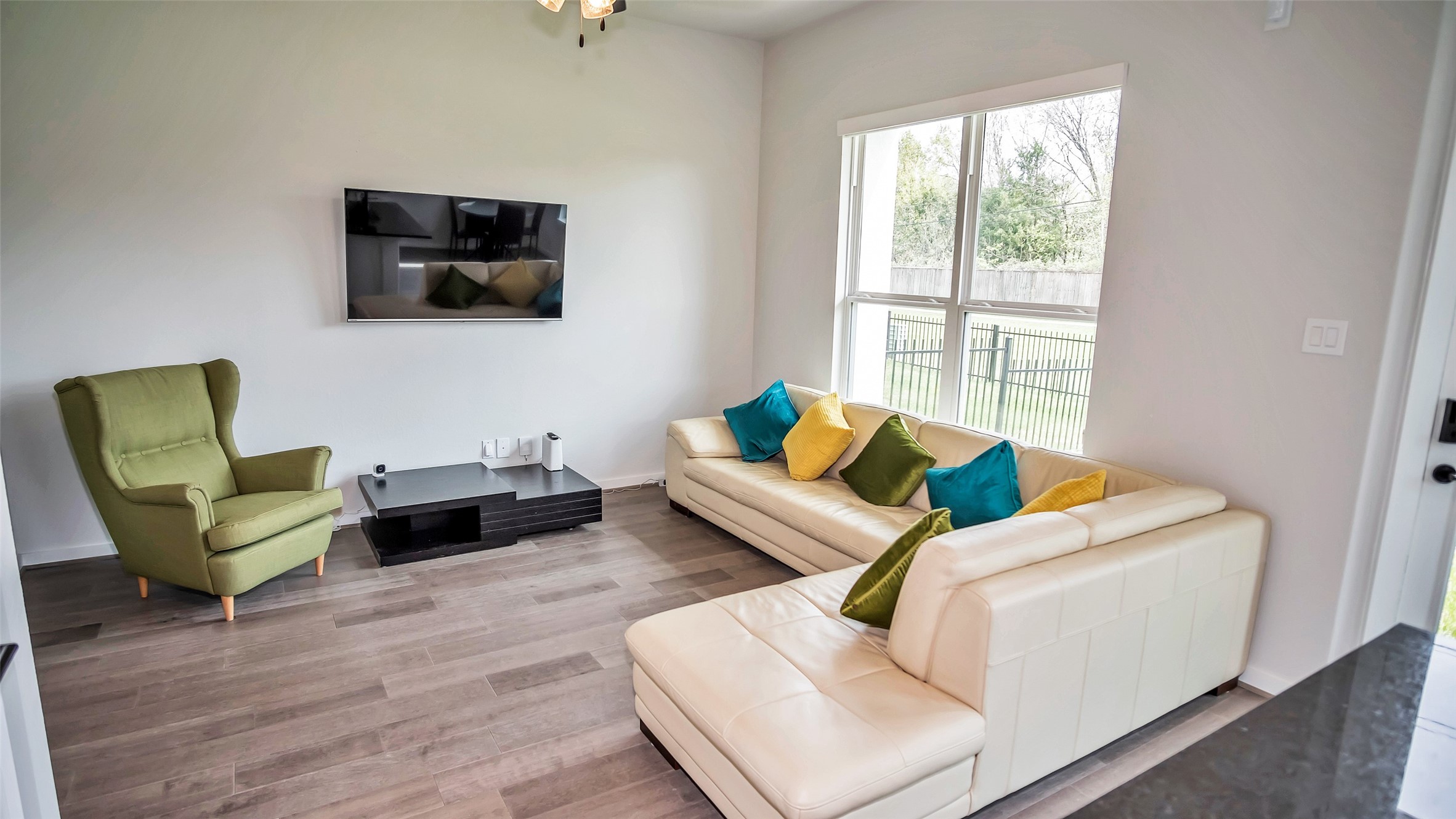 1919 Pueblo Nuevo Path Houston, TX 77077 - Photo 42 of 50 a living room with furniture and a flat screen tv