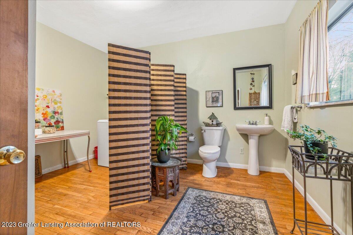 16164 Turner Road Lansing, MI 48906 - Photo 15 of 39 21-Laundry and 1_2bath