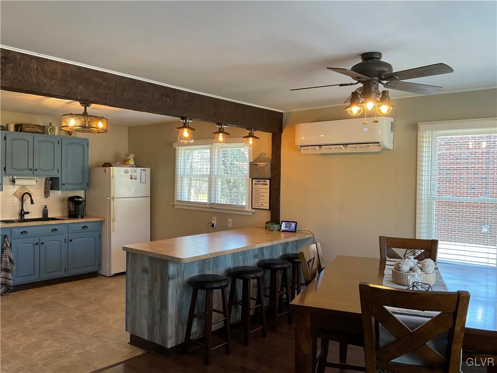 568 Belfast Road Nazareth, PA 18064 - Photo 3 of 12 a dining room with furniture and window