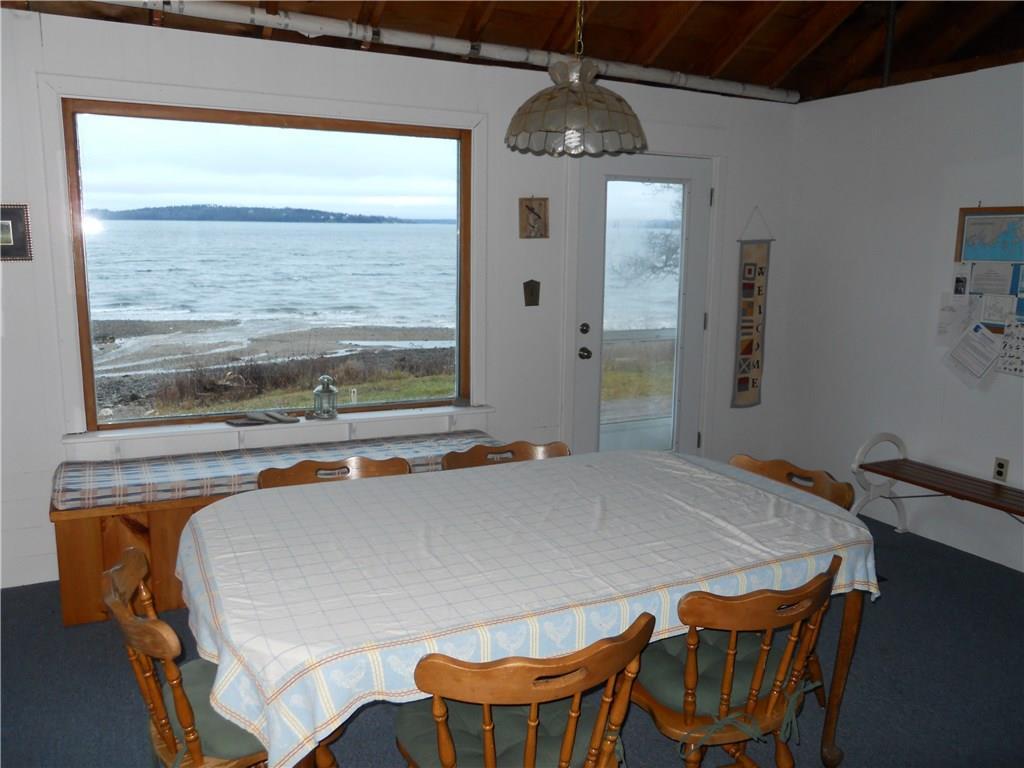 1401 Main Road Islesboro, ME 04848 - Photo 13 of 25 Dining room beach view